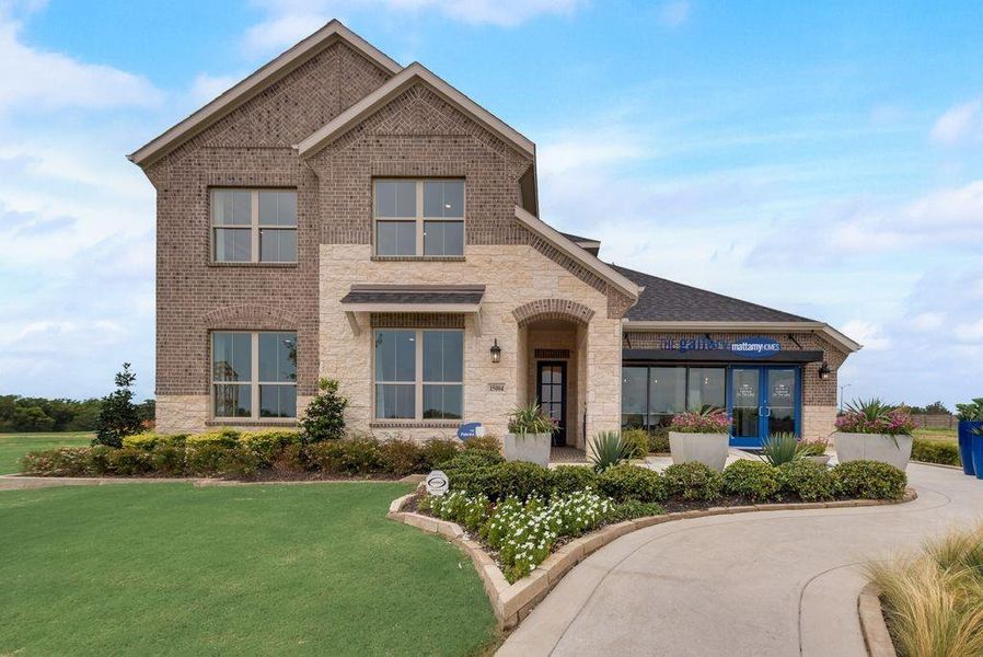Front exterior of a new home in Valencia On The Lake, Little Elm, TX, highlighting curb appeal (Image 19).