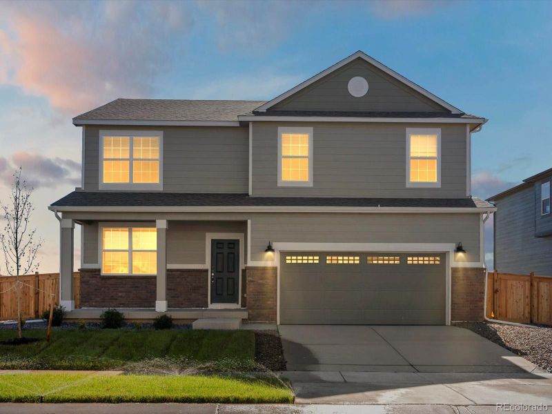 Front exterior of a new home in , Commerce City, CO, highlighting curb appeal (Image 2). Front exterior of a new home in , Commerce City, CO, highlighting curb appeal (Image 2).