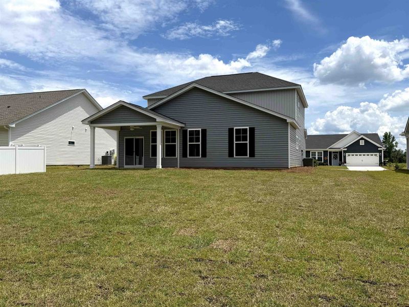 Exterior details and patio area of a home in Westfield, Conway (Image 34).
