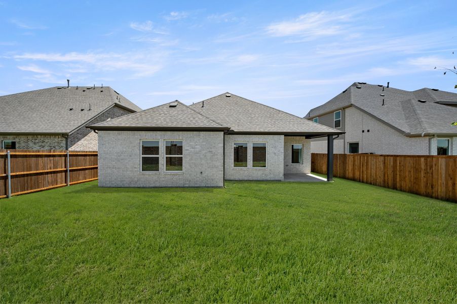 Exterior details and patio area of a home in Wildflower Ranch, Fort Worth (Image 3).