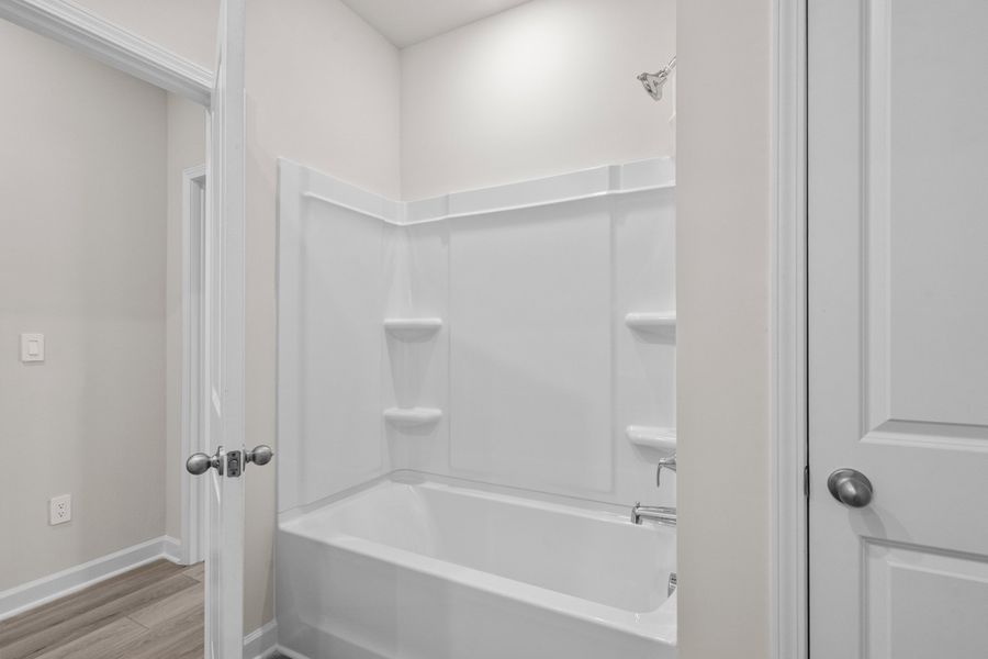 Furnished interior view inside a new home in Cypress Ridge - The Coastline Series, Longs (Image 11).