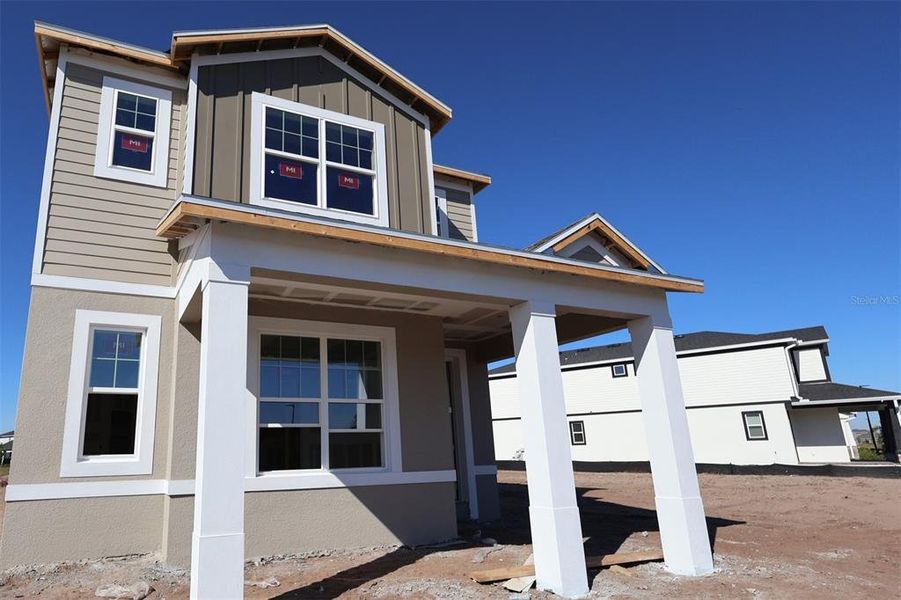 In-progress construction of a new home in Center Lake on the Park, St. Cloud, FL (Image 5).