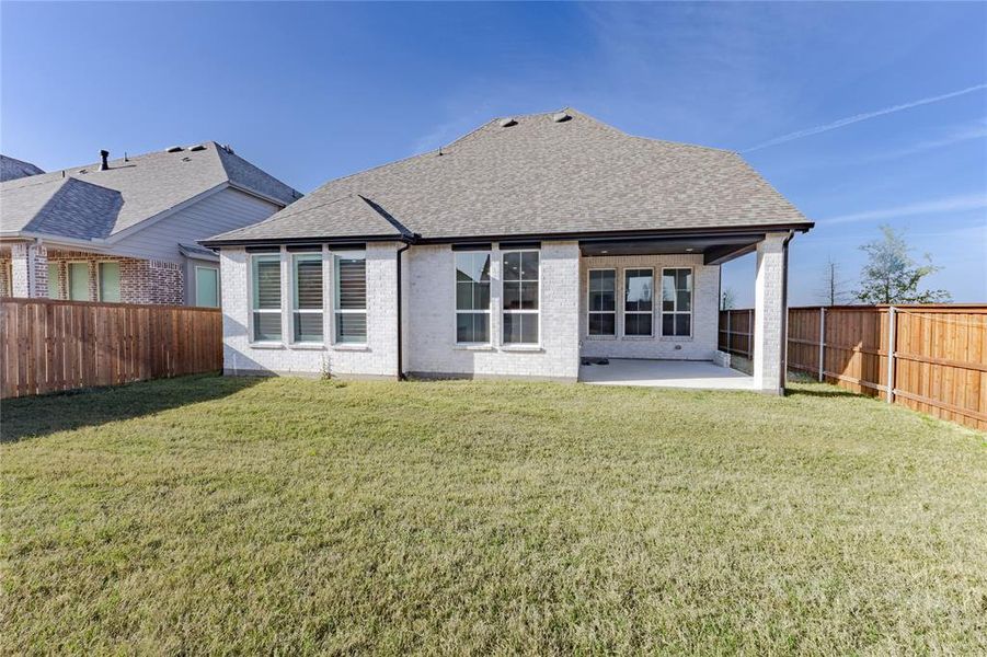 Exterior details and patio area of a home in , Aubrey (Image 26).