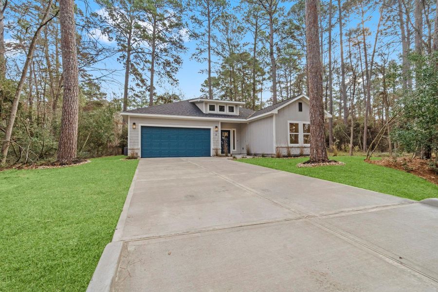 Front exterior of a new home in , Trinity, TX, highlighting curb appeal (Image 26).