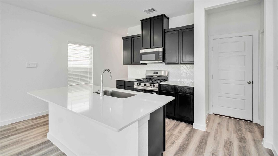 Furnished interior view inside a new home in City Gate, Houston (Image 9).