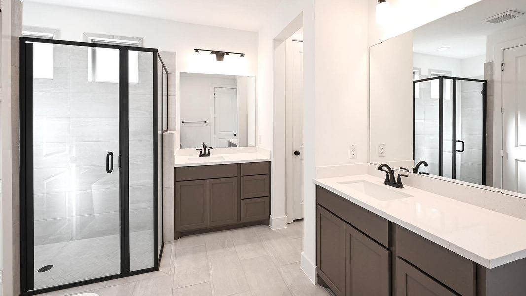 Furnished interior view inside a new home in Crosswinds 50', Kyle (Image 9).