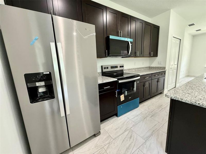 Furnished interior view inside a new home in , Citrus Springs (Image 13).