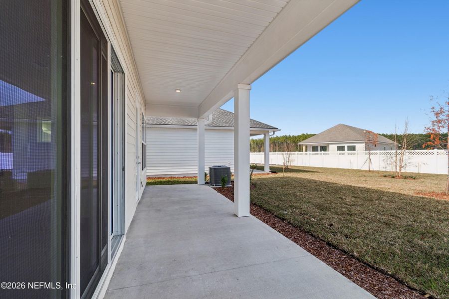 Exterior details and patio area of a home in Evergreen Island at Silverleaf - Executive, St. Augustine (Image 20).