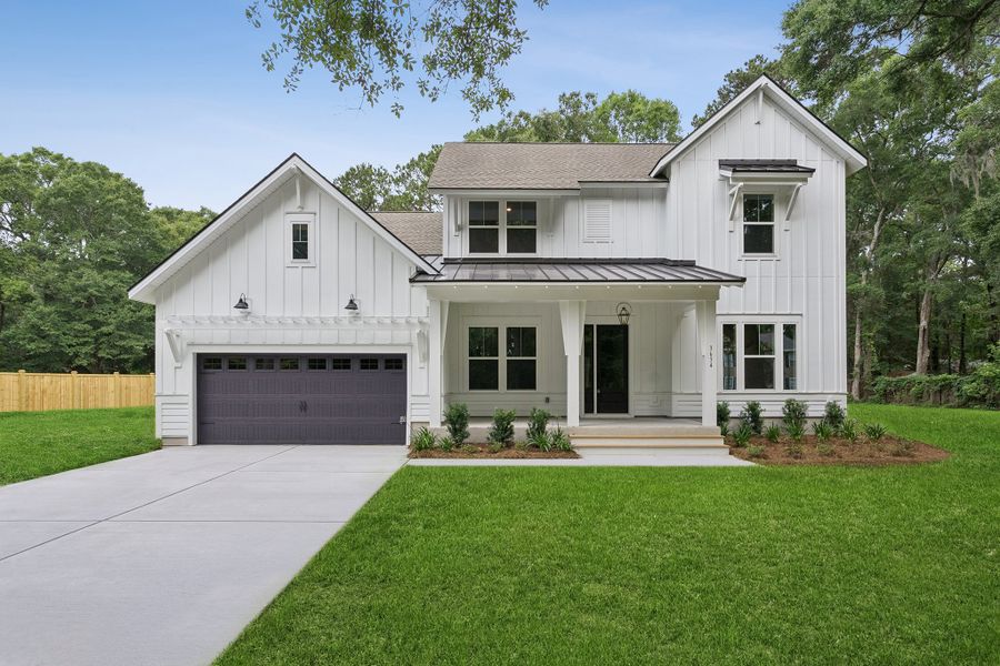 Front exterior of a new home in Discover Series - Signature, Johns Island, SC, highlighting curb appeal (Image 2). Front exterior of a new home in Discover Series - Signature, Johns Island, SC, highlighting curb appeal (Image 2).