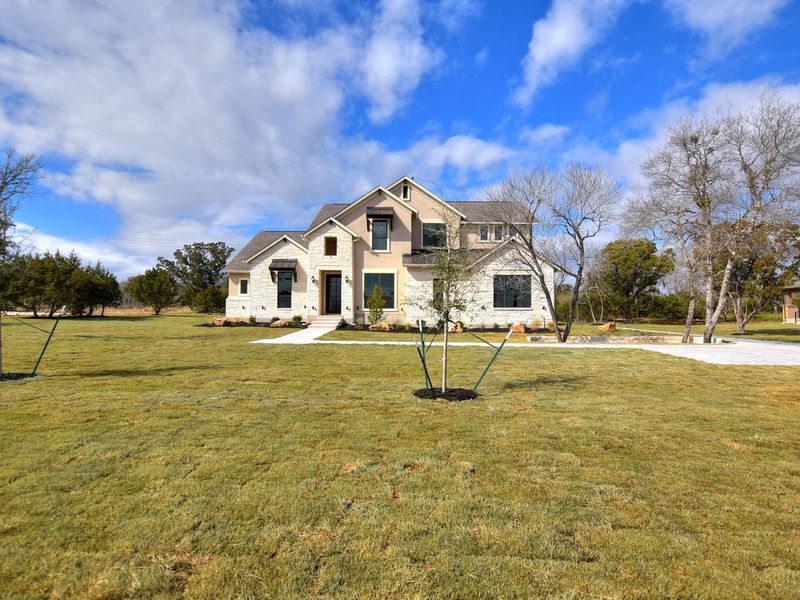 Representative exterior photo of a completed home built from the Madera II by Giddens Homes in Scofield Farms Estates, Georgetown, TX (Image 35).