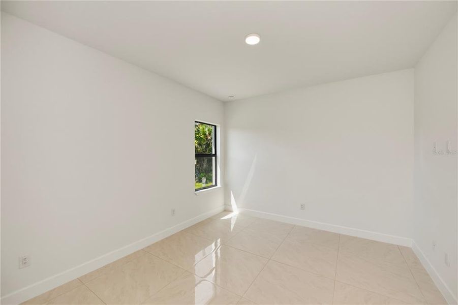 Spacious, unfurnished interior of a new home in , Port Charlotte (Image 43).