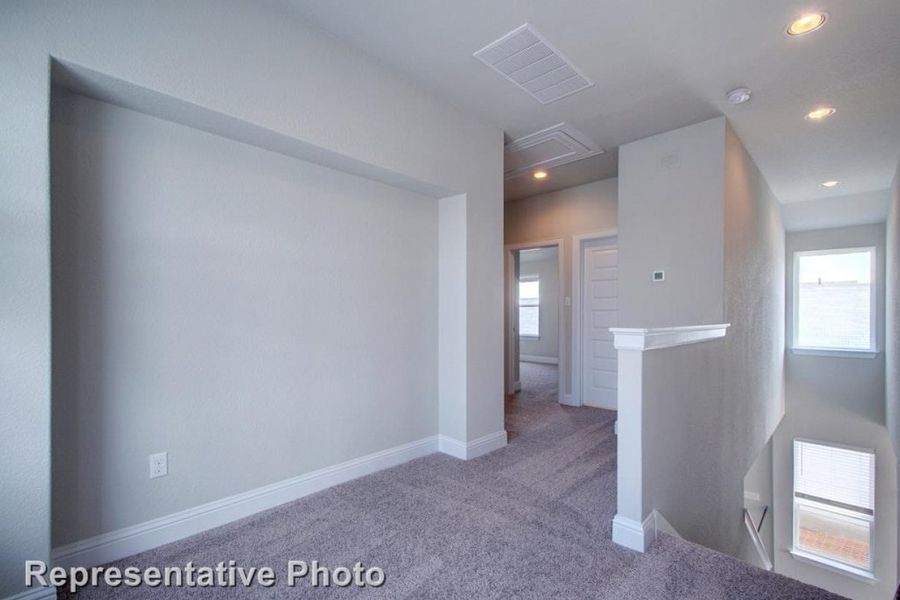 Representative unfurnished interior of a home built from the Clear Creek 1950 by Brohn Homes in Clear Creek, Round Rock (Image 18).