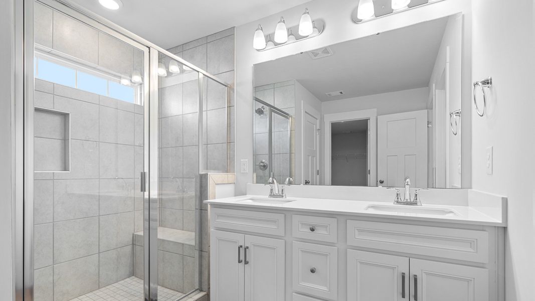 2 story single family home, all white, owner's bath