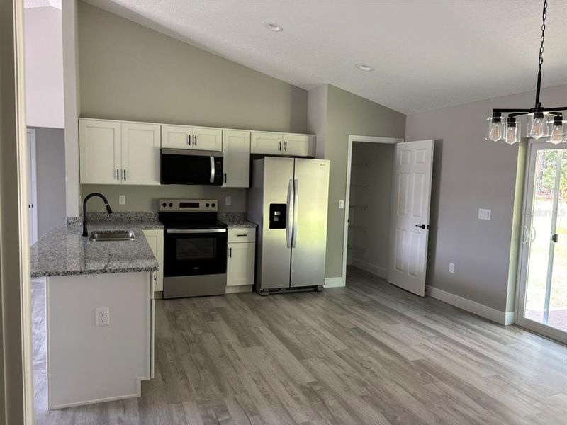 Furnished interior view inside a new home in , Dunnellon (Image 9).