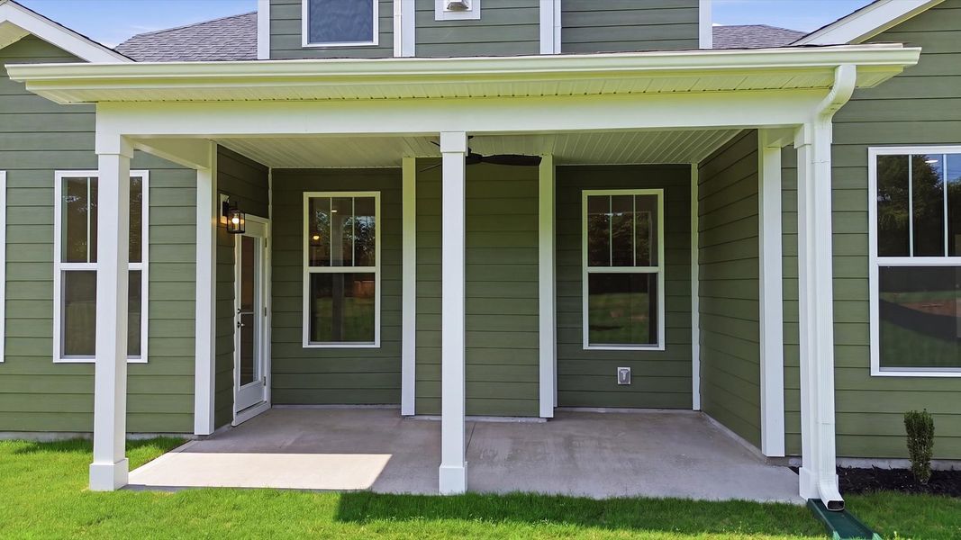 Established charm meets functional outdoor living with a spacious rear covered porch located in Woodruff, SC Established charm meets functional outdoor living with a spacious rear covered porch located in Woodruff, SC