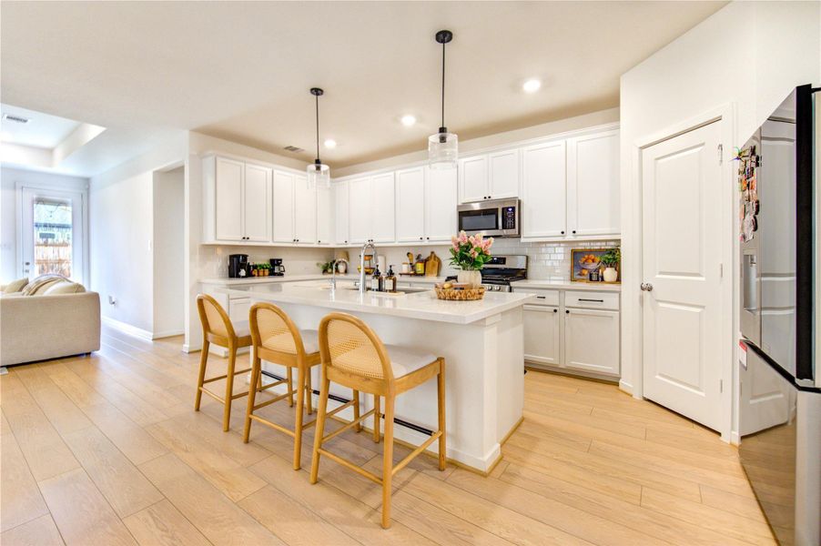 Exquisite gourmet kitchen is a true chef’s haven, thoughtfully designed to balance practicality with a polished, contemporary aesthetic. Its well-planned layout enhances both efficiency and visual appeal, creating an inspiring space for cooking, gathering, and everyday living. With its refined finishes and functional design, it offers the perfect environment to elevate your culinary creativity.