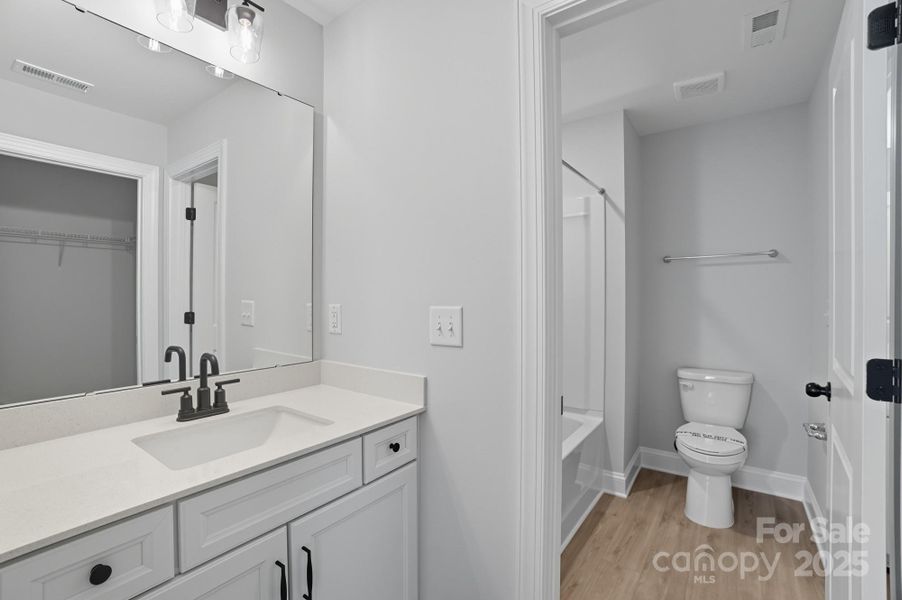 Furnished interior view inside a new home in Heritage - 55+ Community, Wesley Chapel (Image 7).