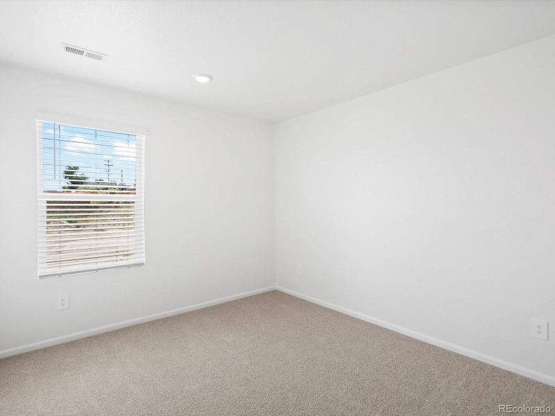 Spacious, unfurnished interior of a new home in Poudre Heights: The Lakes Collection, Windsor (Image 26).