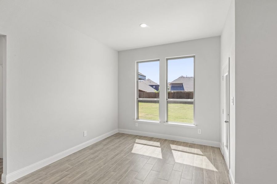 Representative exterior photo of a completed home built from the Hampton by Impression Homes in Timberbrook, Justin, TX (Image 10). Representative exterior photo of a completed home built from the Hampton by Impression Homes in Timberbrook, Justin, TX (Image 10).