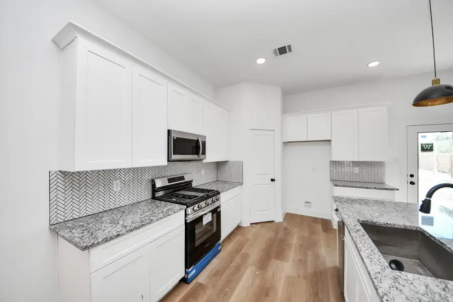Furnished interior view inside a new home in , Huffman (Image 13).