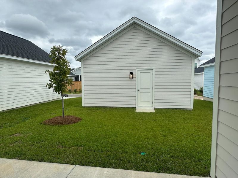 Exterior details and patio area of a home in Nexton - Midtown, Summerville (Image 11).