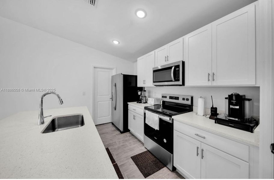 Furnished interior view inside a new home in , Cape Coral (Image 3).