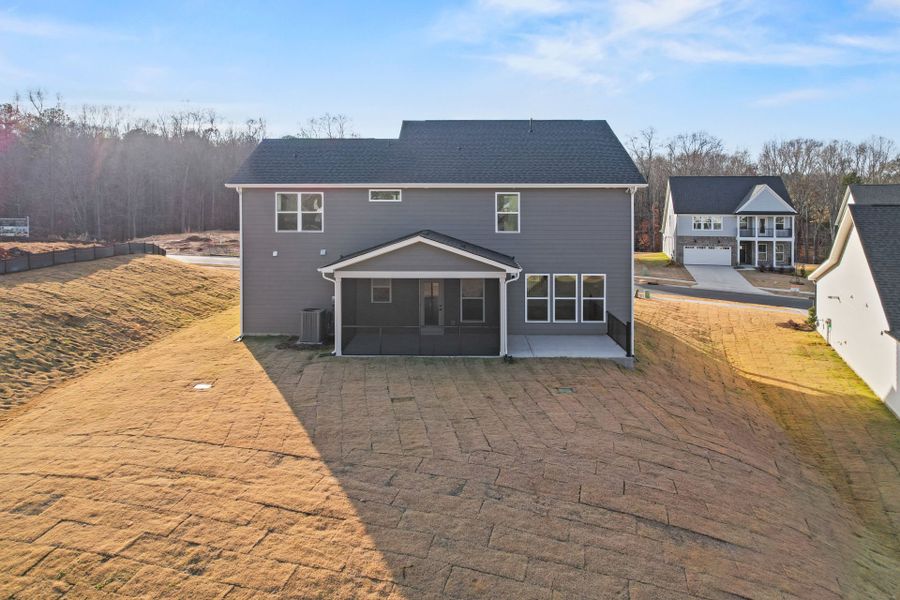 Exterior details and patio area of a home in Forest Creek, Waxhaw (Image 29).
