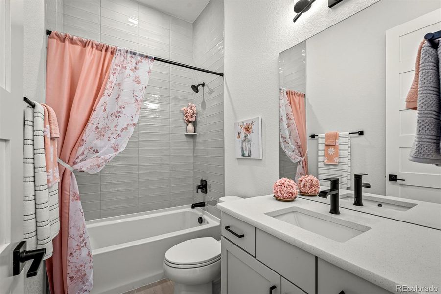 Furnished interior view inside a new home in Cloverleaf - Pinnacle Collection, Monument (Image 7).