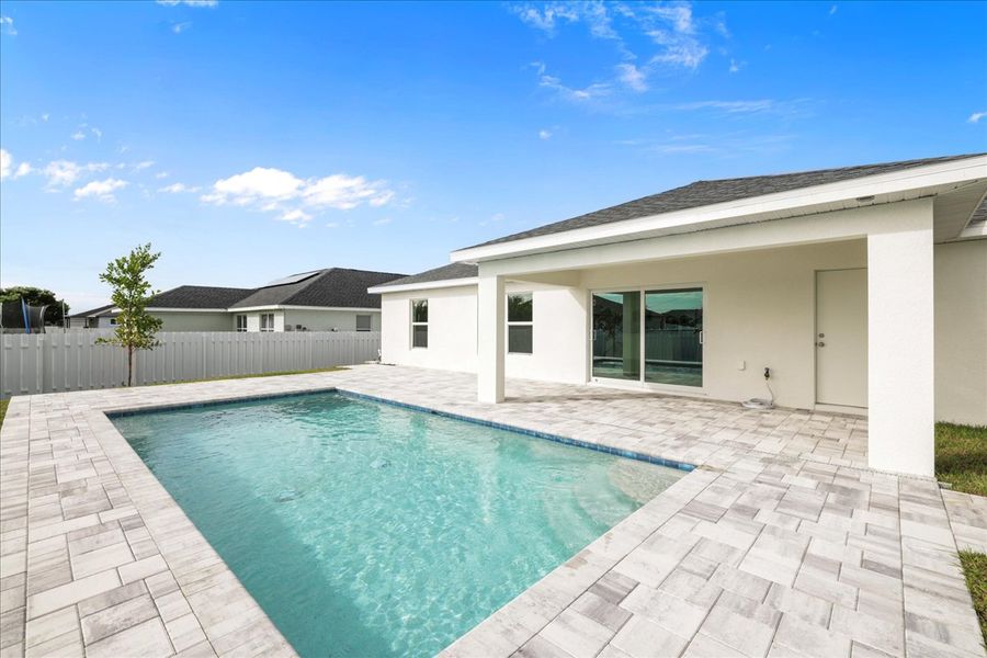 Representative exterior details of a home built from the The Sunset Harbor with Pool by Sunlife Homes LLC in Cape Coral, Cape Coral (Image 24). Representative exterior details of a home built from the The Sunset Harbor with Pool by Sunlife Homes LLC in Cape Coral, Cape Coral (Image 24).