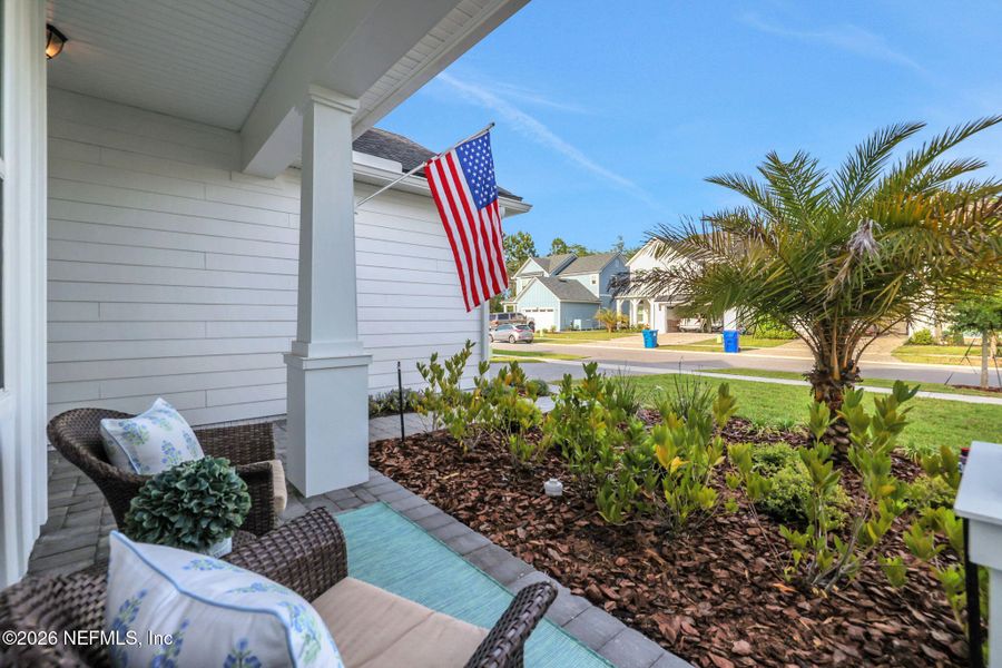 Exterior details and patio area of a home in Settler's Landing at Nocatee, Ponte Vedra (Image 3).