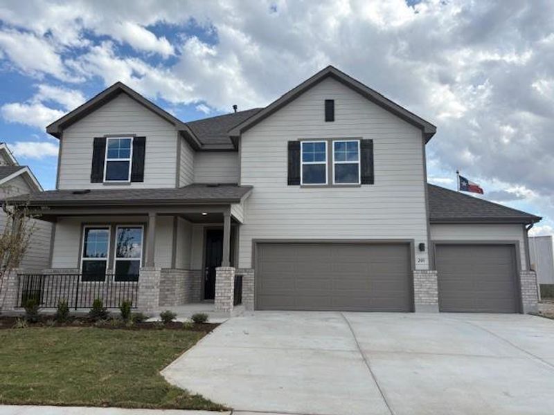 View of front of house featuring a porch, concrete driveway, a front yard, a shingled roof, and brick siding View of front of house featuring a porch, concrete driveway, a front yard, a shingled roof, and brick siding