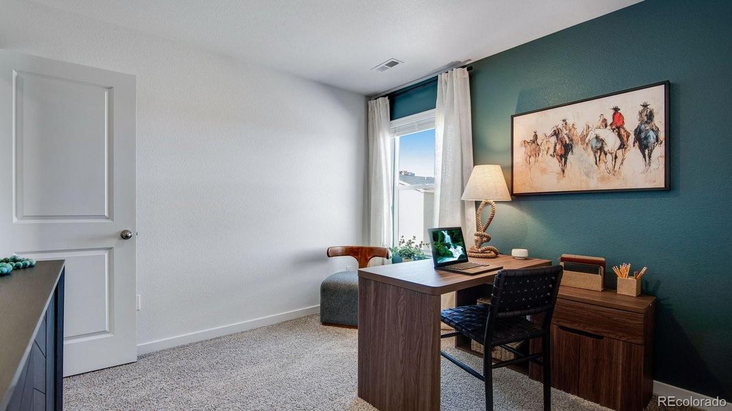 Furnished interior view inside a new home in The Ridge at Lorson Ranch, Colorado Springs (Image 9).