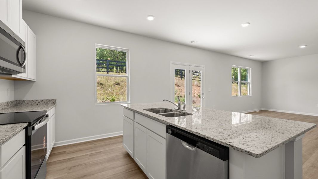 Representative furnished interior of a home built from the Belhaven by D.R. Horton in Creekview, Atlanta (Image 7).