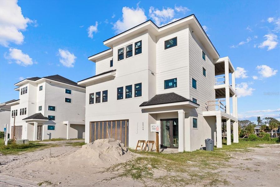 Exterior details and patio area of a home in , Sarasota (Image 16).
