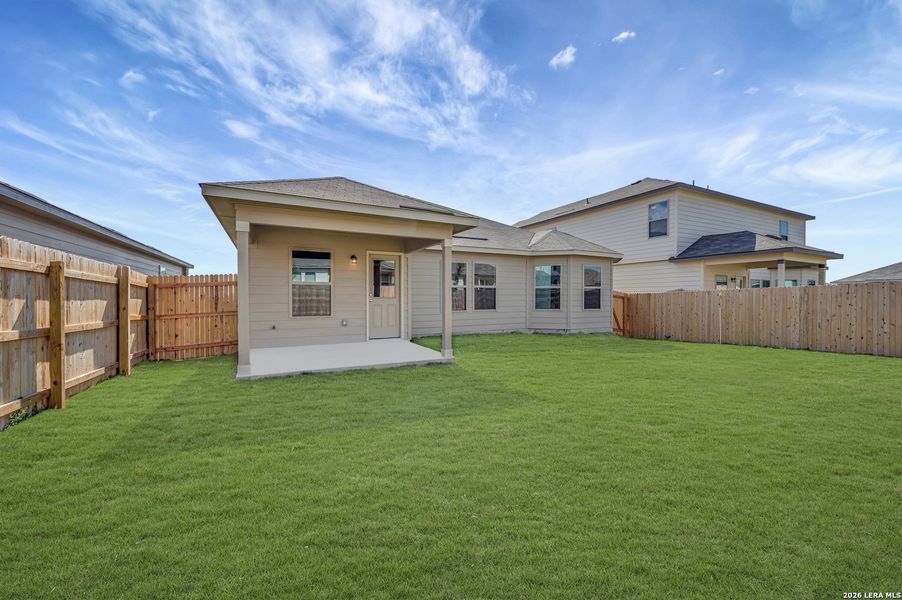 Exterior details and patio area of a home in Paloma Park, Converse (Image 29).