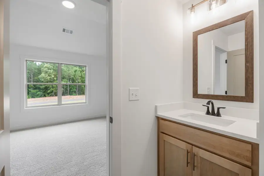 Furnished interior view inside a new home in Flint Farms, Concord (Image 9).