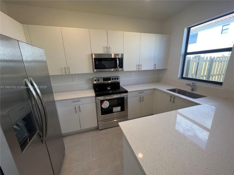 Furnished interior view inside a new home in , Homestead (Image 7).