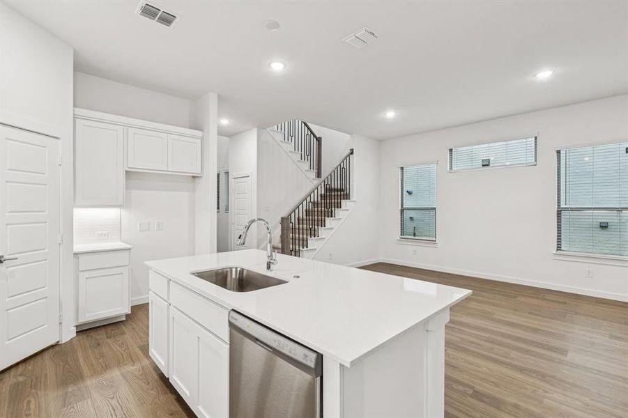 Kitchen in the Picasso II home plan by Trophy Signature Homes – REPRESENTATIVE PHOTO