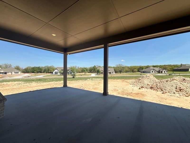 Exterior details and patio area of a home in Oak Grove Addition, Springtown (Image 3).