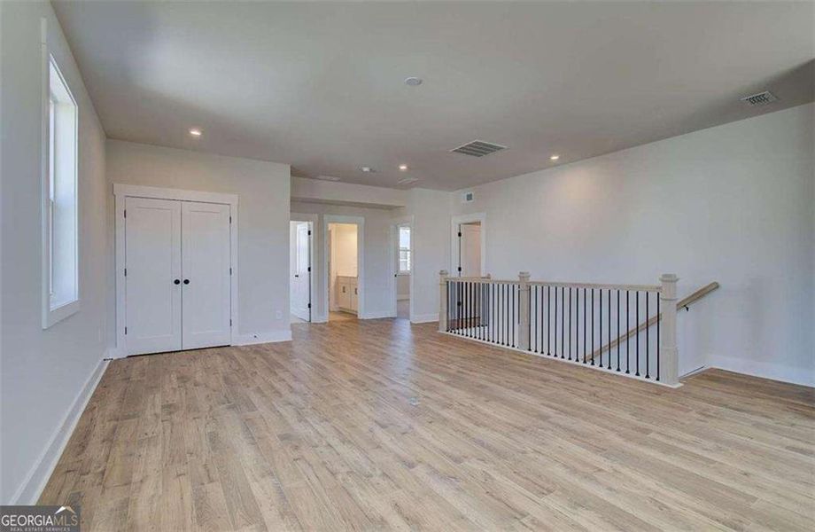 Spacious, unfurnished interior of a new home in The Paddocks at Doc Hughes, Buford (Image 23).