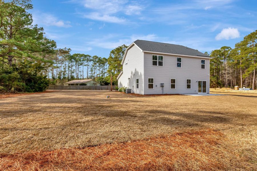 Exterior details and patio area of a home in , Awendaw (Image 3).