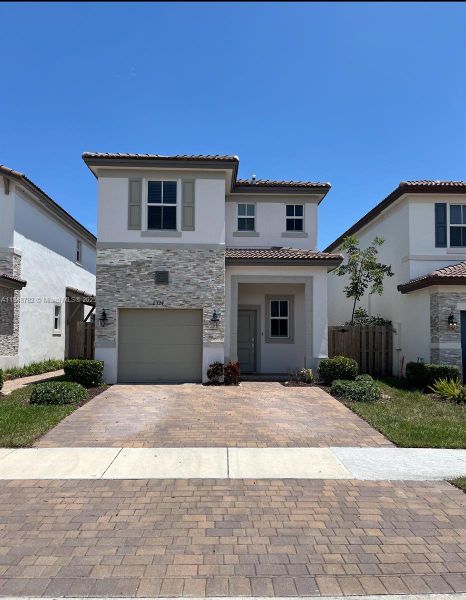 Front exterior of a new home in , Miami, FL, highlighting curb appeal (Image 10). Front exterior of a new home in , Miami, FL, highlighting curb appeal (Image 10).