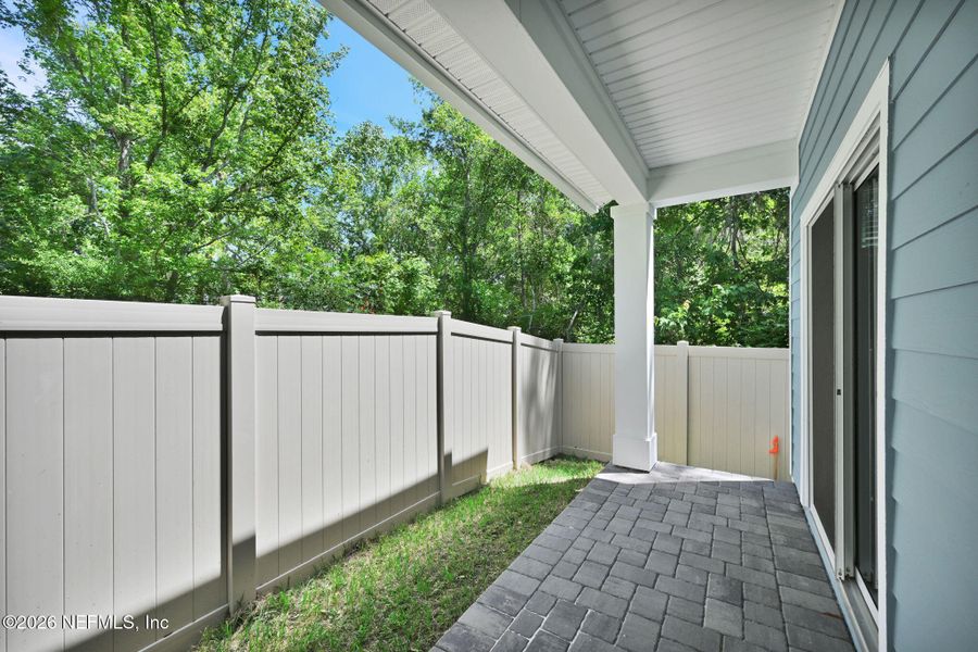 Exterior details and patio area of a home in Baxley Villas, Middleburg (Image 3).