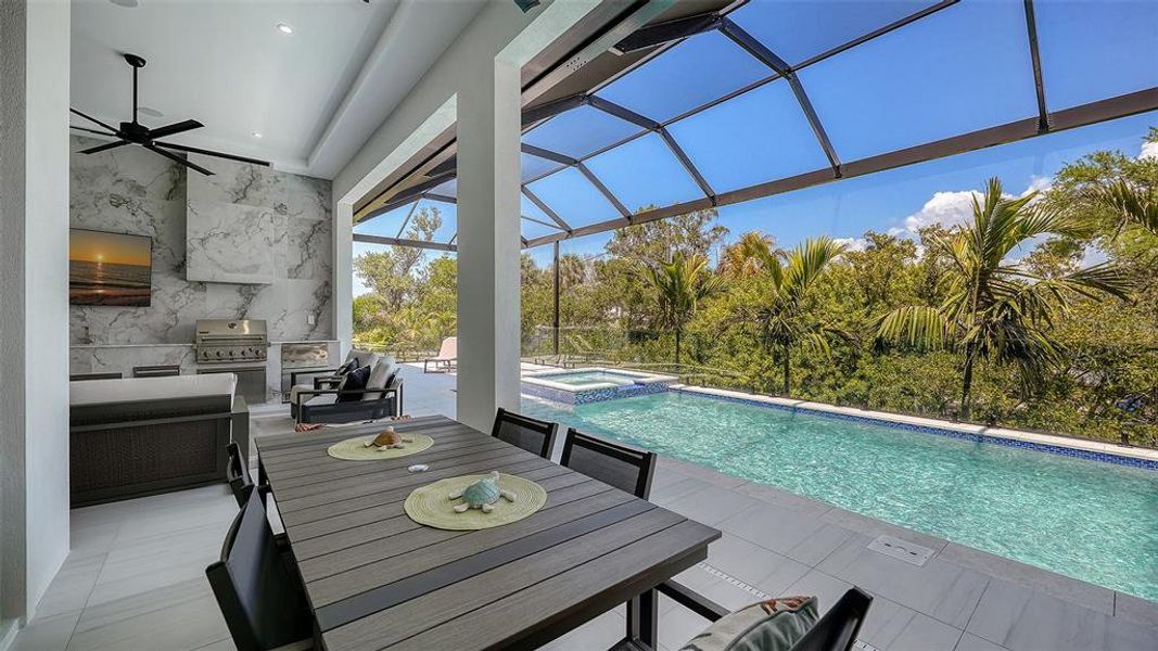 Exterior details and patio area of a home in , Sarasota (Image 24).