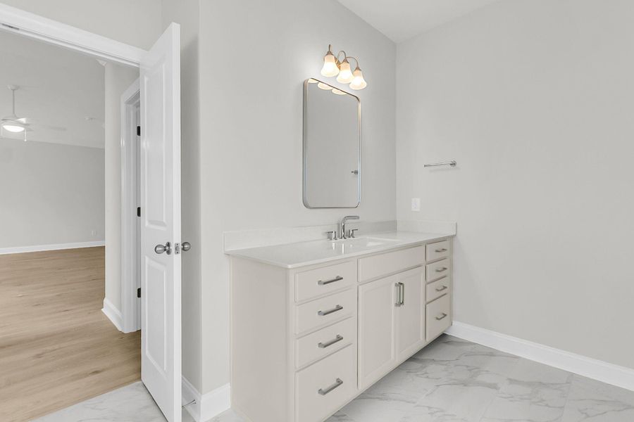 Furnished interior view inside a new home in Tidewater at Lakes of Cane Bay, Summerville (Image 27).