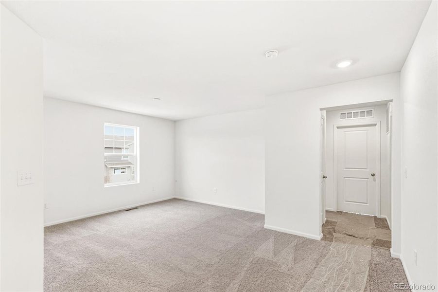 Spacious, unfurnished interior of a new home in Sky Ranch Villas, Watkins (Image 18).