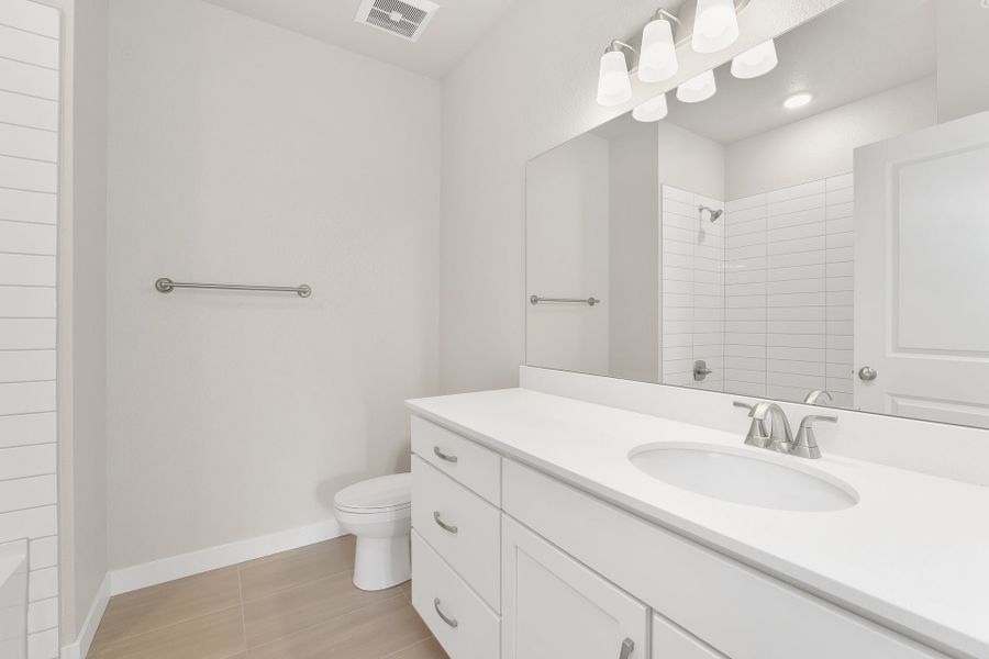Furnished interior view inside a new home in The Lakes at Centerra, Loveland (Image 9).