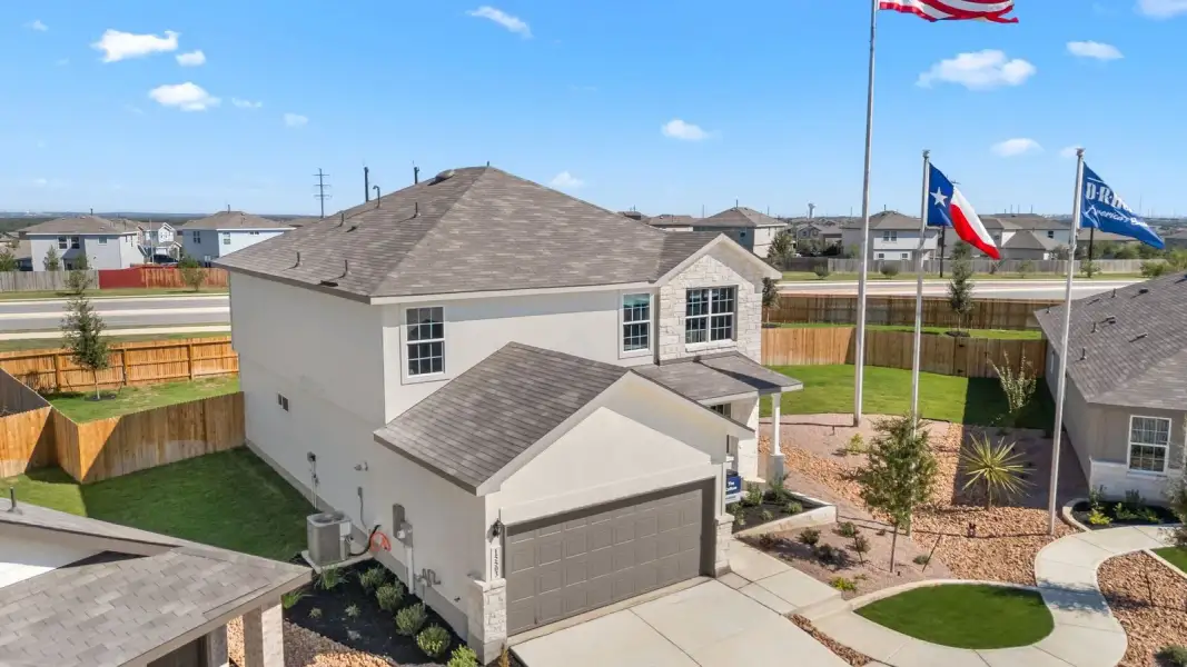 Representative exterior photo of a completed home built from the The Knight by D.R. Horton in High Garden, Comfort, TX (Image 2). Representative exterior photo of a completed home built from the The Knight by D.R. Horton in High Garden, Comfort, TX (Image 2).