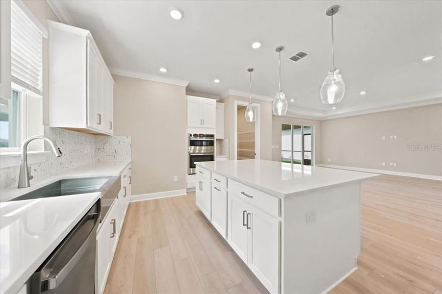 Furnished interior view inside a new home in Coasterra Community Group Page, Palmetto (Image 10).
