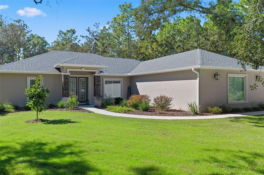 Front exterior of a new home in , Beverly Hills, FL, highlighting curb appeal (Image 24). Front exterior of a new home in , Beverly Hills, FL, highlighting curb appeal (Image 24).